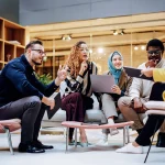 people, group, indoor, sitting, technology